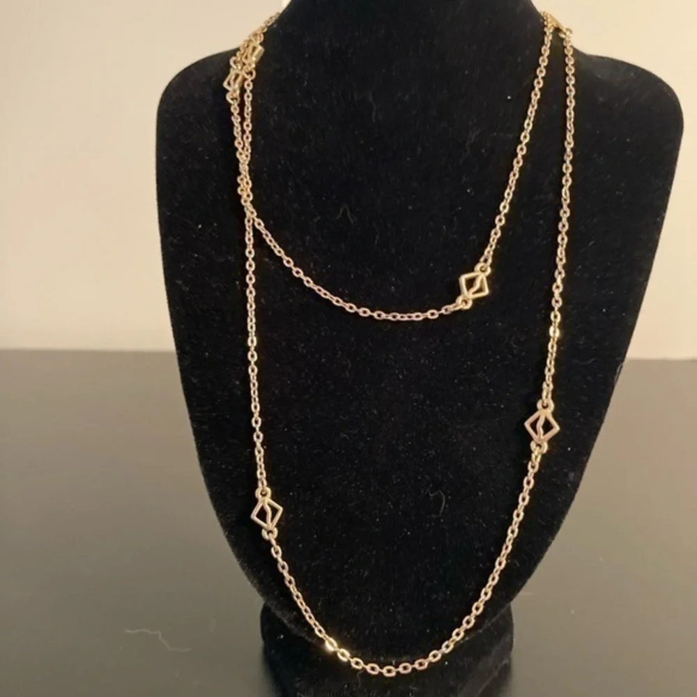 Golden necklace 16” has pretty dainty details.